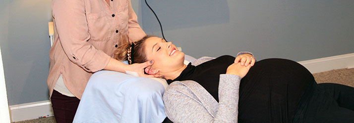 Chiropractor Durham NC Dr. Danielle Fratellone with Pregnant Patient Chiropractor Durham NC Dr. Danielle Fratellone with Pregnant Patient